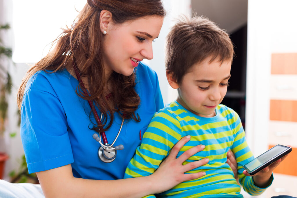 Young nurse with child